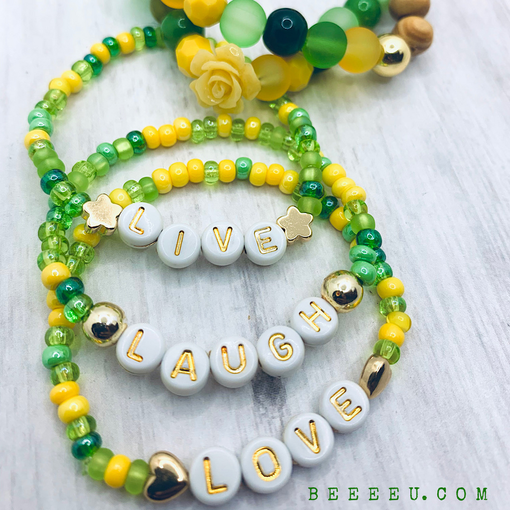 beeeeu live,laugh,love bracelet set in green and yellow