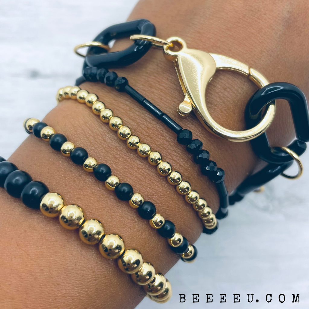 beeeeu link bracelet in black and gold 