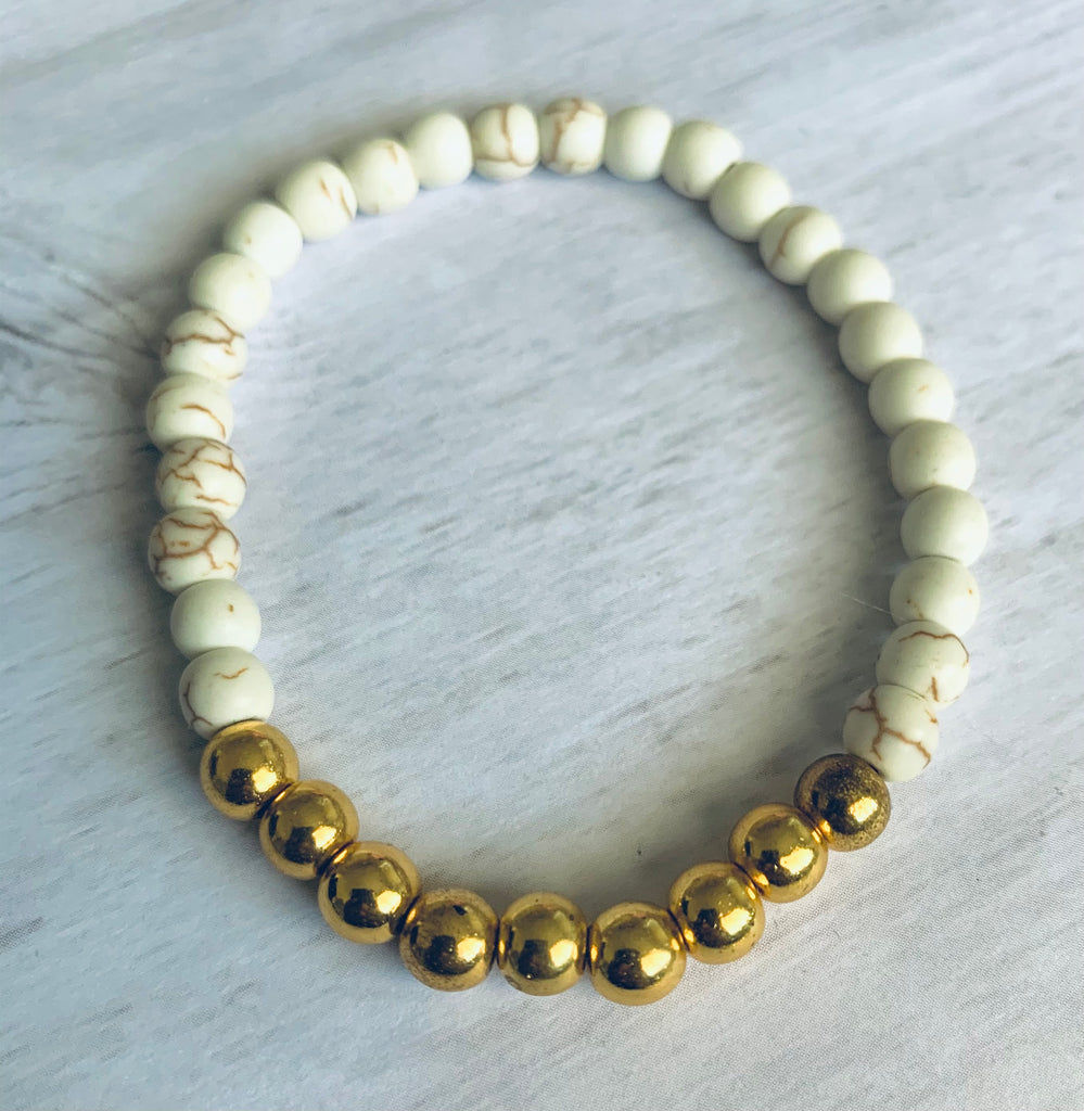 8mm howlite and gold hematite bracelet set. four bracelets in this set