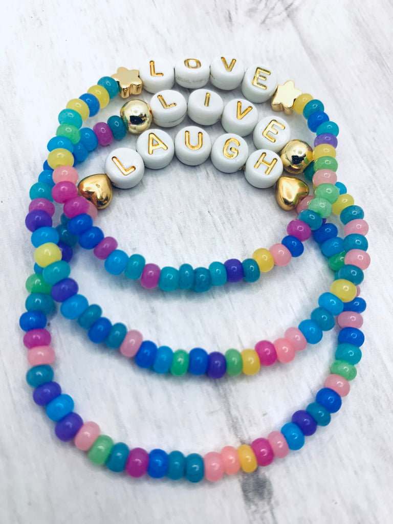 white and gold letter beads with purple and blue live laugh and love beeeeu